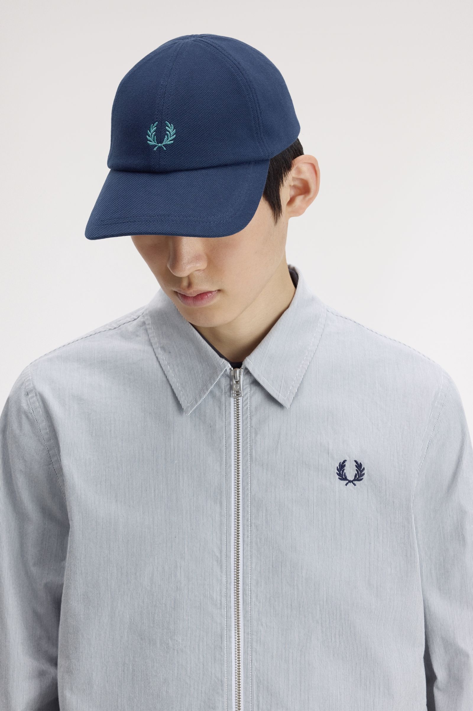 Fred Perry Piqué adjustable cap in various colors.